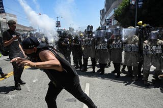 Law enforcement officials confirmed demonstrators removed from the federal building while protests continued in response to Federal Operations of Immigration on Tuesday